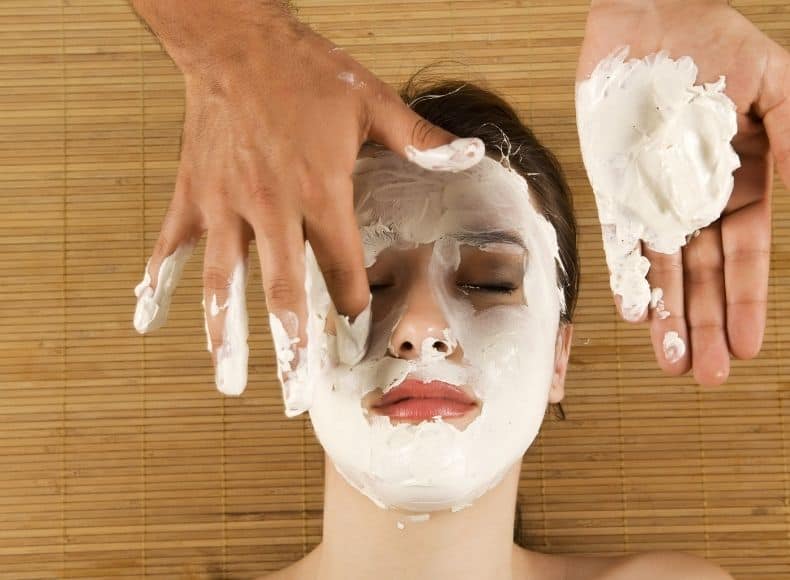 applying homemade face masks for skin tightening on a woman face